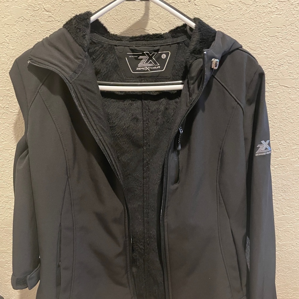 gray jacket with fur on the inside